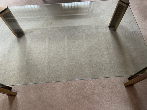 Schitterende salontafel met zware messing poten 