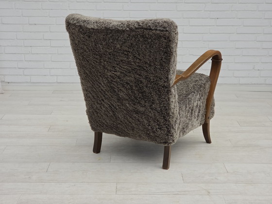 Image 1 of 1960s Reupholstered Danish Armchair in New Zealand Genuine Sheepskin