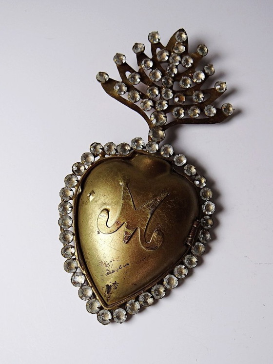 Image 1 of Ex voto antico, cuore fiammeggiante di Maria di Pomponne, tempestato di strass, XIX-XX secolo.