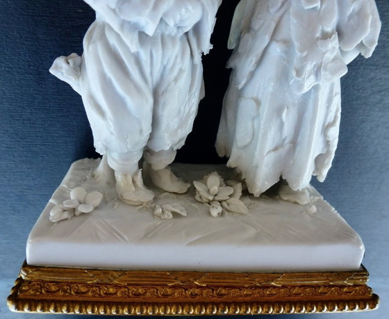 Image 1 of Luxury sponge porcelain figurine with gold leaf finish.