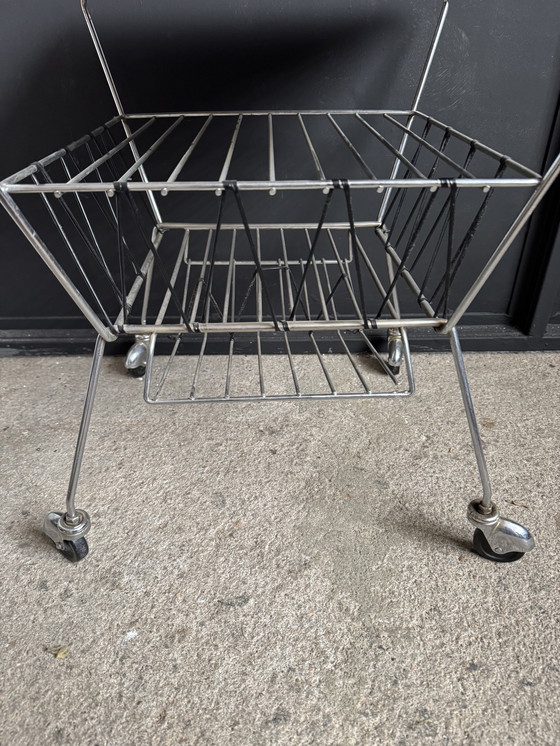 Image 1 of 1950s rolling newspaper rack