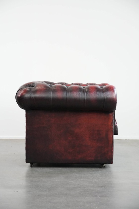 Image 1 of Englischer Chesterfield-Ledersessel auf Rollen, verziert mit Ziernieten