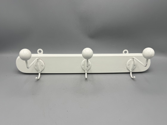 Image 1 of Mid - Century coat rack sleek and timeless design