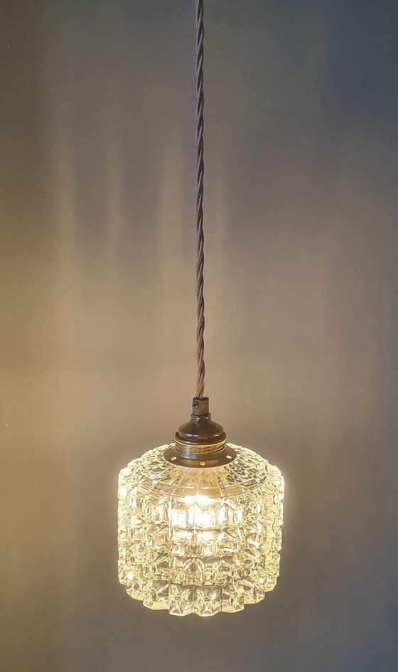 Image 1 of Mid-century vintage pendant lamp of thick, textured glass.