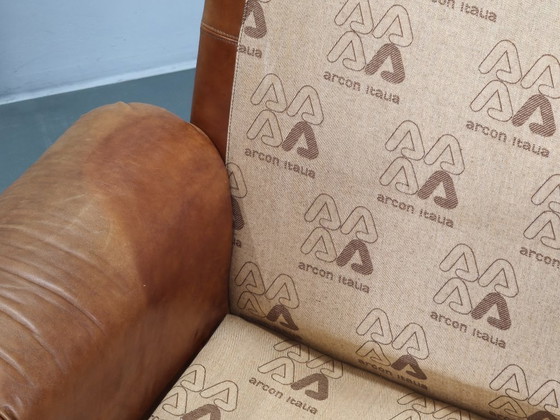 Image 1 of Een paar Arcon Italia loungefauteuils van cognacbruin buffelleer.