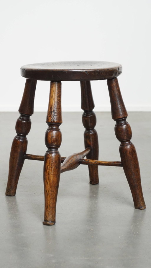 Antique English Windsor stool from early 19th century
