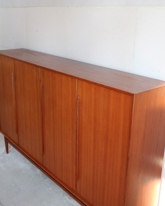 Image 1 of XXL teak highboard, German design classic by Heinrich Rietsenpatt