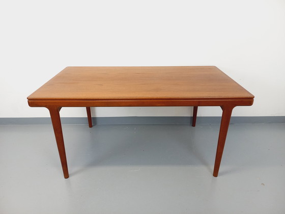 Image 1 of Scandinavian rectangular vintage dining table by Johannes Andersen for Samcom from the 60s in teak with integrated extensions