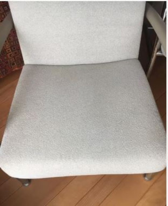 Image 1 of Poltroncina elicoidale Leolux. Il colore è melange sabbia/crema.