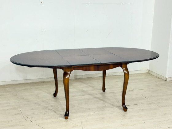Image 1 of Elegante eettafel uit het midden van de 20e eeuw / Vintage keukentafel / Uitschuifbare tafel / Ronde Chippendale eettafel
