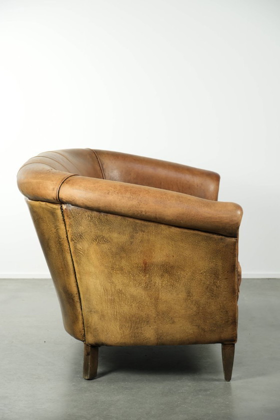 Image 1 of Karaktervolle schapenleren 2 zits bank met een mooie vintage look