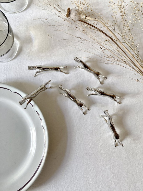 Image 1 of Zes verzilverde metalen messenhouders in de vorm van paarden. Jaren 60.