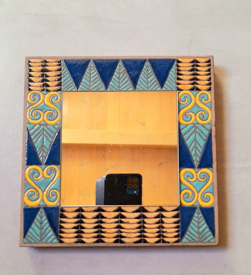 Enameled lava mirror