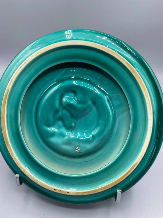 Sottopentola in ceramica smaltata, con decorazione a rilievo di un anatroccolo, smalto turchese, Francia. (photo 3 of 4)
