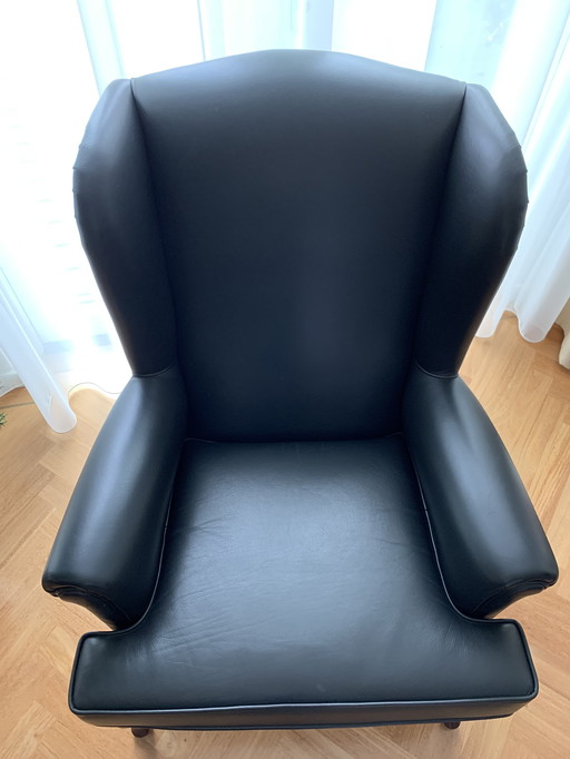 Fauteuil en cuir pointu