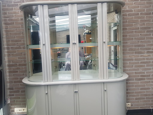 Display case with curved glass and lighting