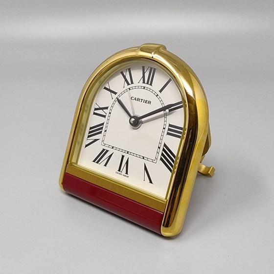 Image 1 of Cartier "Romane" reis- en bureauwekker uit de jaren 80, verguld met 18 karaats goud, inclusief originele doos en papieren.