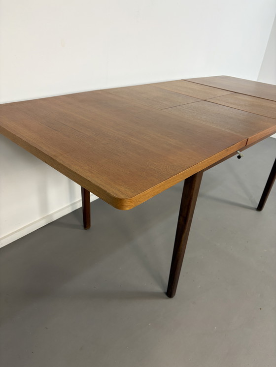Image 1 of Tafel in teak vintage uitschuifbare jaren' 60. Uitgeschoven 190 cm