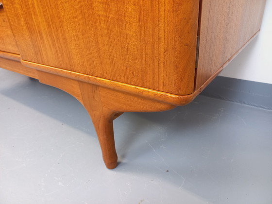 Image 1 of Scandinavische vintage kledingkast in teakhout uit de jaren 60 van ontwerpers Tricoire en Vecchione voor "Meubles TV Paris".