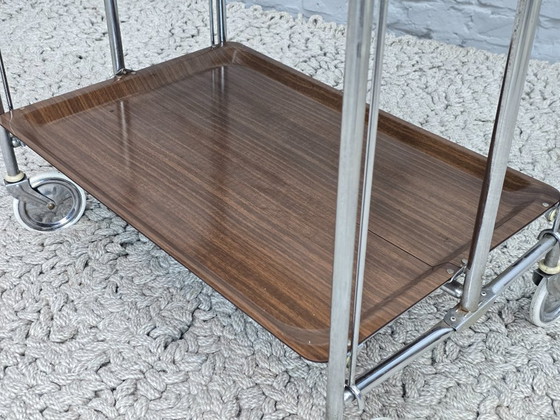 Image 1 of Vintage Foldable and Mobile Chrome Steel 3 Faux Wood Layers ‘Dinett’ Serving Trolley by Gerlinol, Germany, 1970s. 