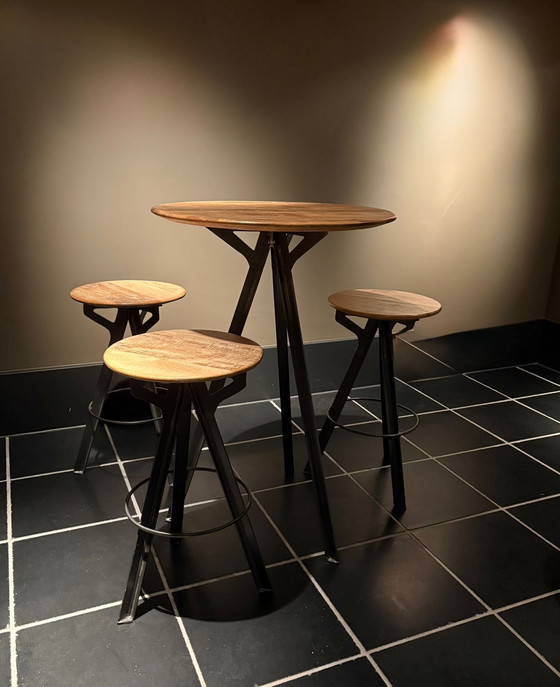 Image 1 of High wooden table with 3 stools