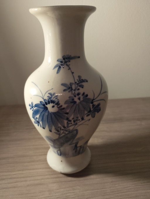 Antique small blue and white Chinese porcelain vase with floral decoration and monogram