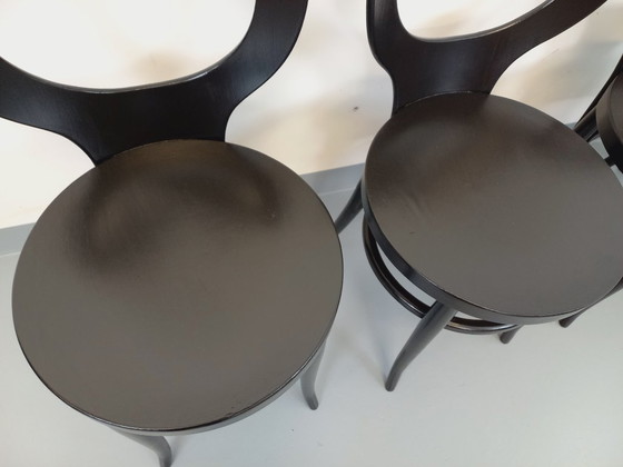 Image 1 of Set van 4 vintage Baumann Mouette stoelen in zwart hout uit de jaren 70.