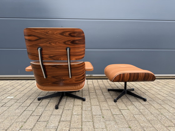 Image 1 of Poltrona lounge Vitra Eames XL + poggiapiedi, in pregiata pelle nera e palissandro Santos. NUOVA!!