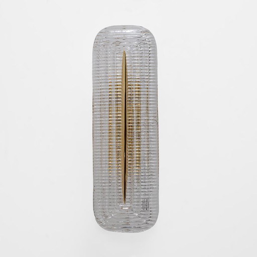 Par de apliques modernos de cristal de Murano transparente y latón, Italia