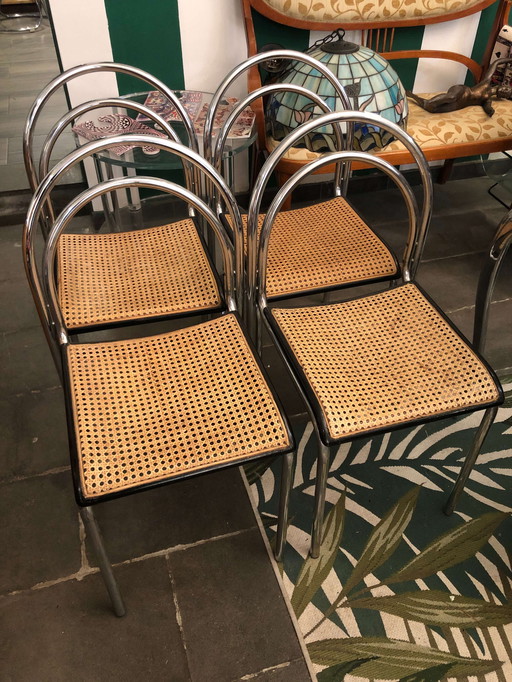 4 Chairs with straw seats in the style of Willy Rizzo, 1970s