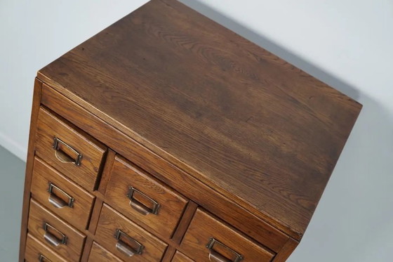 Image 1 of Antieke Nederlandse eiken apothekers- / archiefkast, jaren 1930