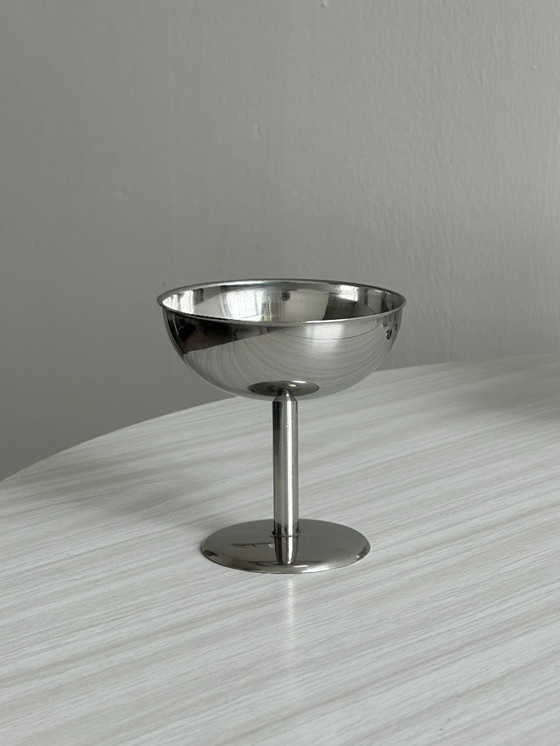 Image 1 of 8 bowls on stainless steel stand