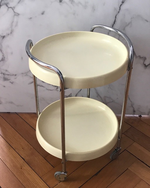 Deserte or vintage side table on castors