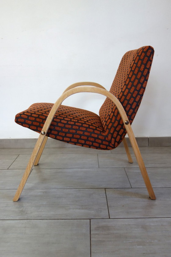 Image 1 of Een paar Bow Wood fauteuils van Steiner, jaren 1950.
