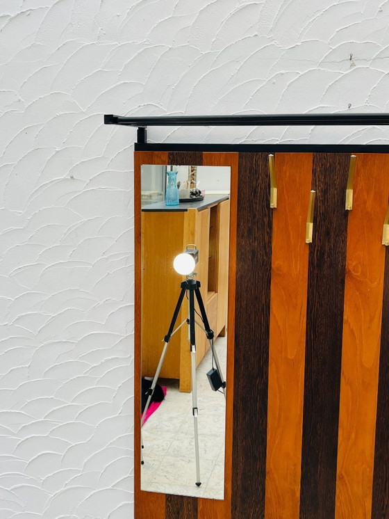 Image 1 of Vintage wandkast met opbergbankje uit de jaren 70.