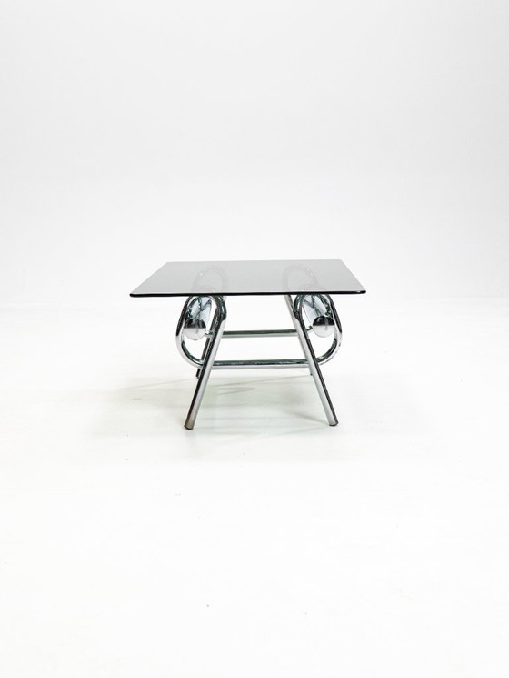 Image 1 of Tavolino da caffè scultoreo cromato con nodo degli anni '70