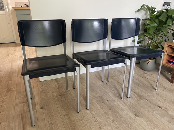 Image 1 of 4x Matteo Grassi eetkamerstoelen donkerblauw 