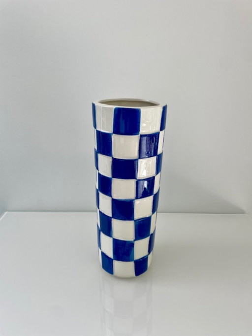 Blue and white vase with embossed diamond pattern