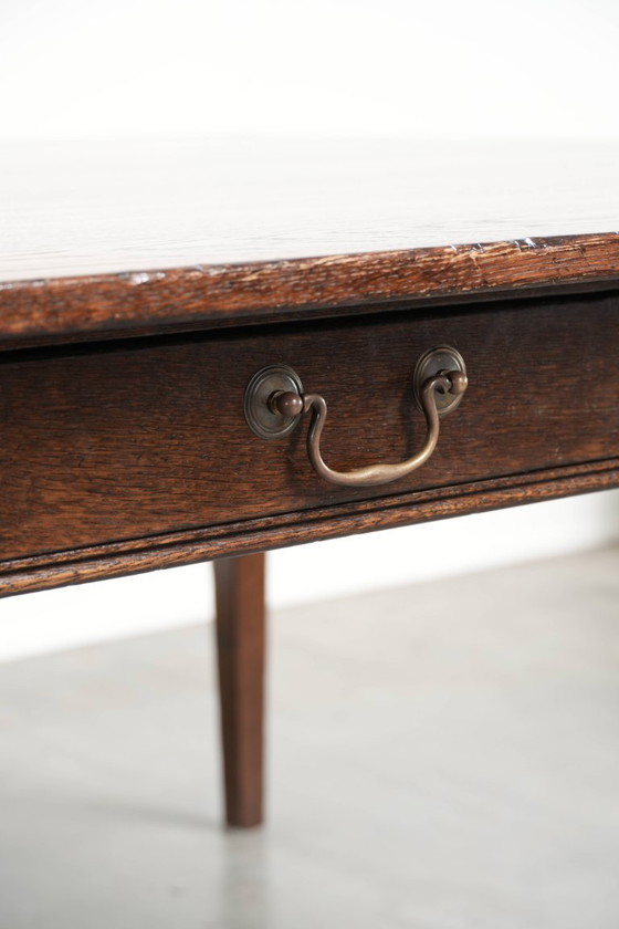 Image 1 of Oude vierkante eikenhouten eettafel uit midden 20e eeuw met 2 lades en prachtige kleuren