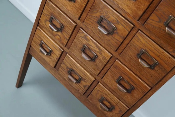 Image 1 of Antieke Nederlandse eiken apothekers- / archiefkast, jaren 1930