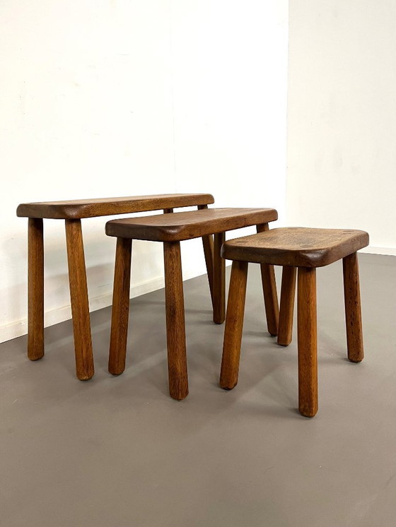 Image 1 of 3 solid Brutalist oak side tables, France, 1960s.