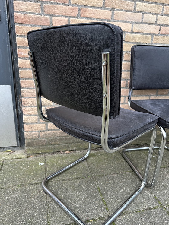 Image 1 of 6 sillas con aspecto de cuero y estructura tubular cromada