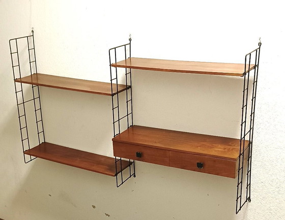 Image 1 of groot vijftiger jaren wandrek met lades en schappen 