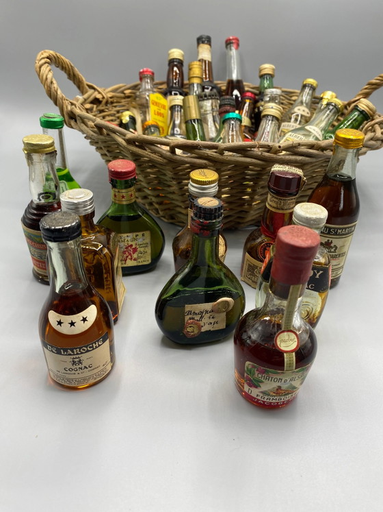 32 vintage miniature spirit bottles and large wicker basket – Decorative Objects, Glass, Mid Century Modern (photo 8 of 8)