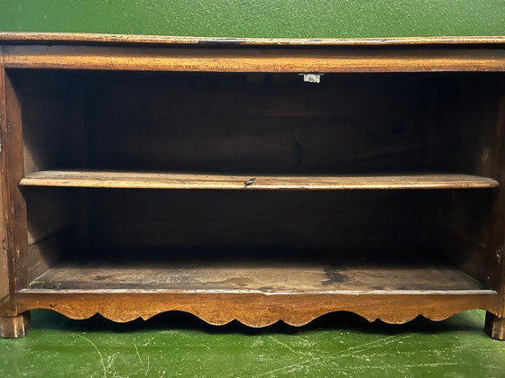 Image 1 of A very small rustic walnut sideboard