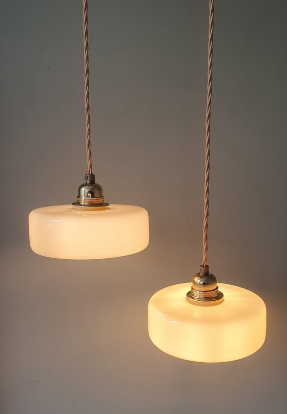 Image 1 of Vintage pendant lamp set (2) of yellow pastel opaline glass. Art Deco design.