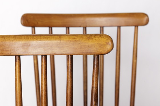 Image 1 of Paar Vintage stoelen met spilrugleuning - 1970 Beukenhout, gerestaureerde rustieke zitting