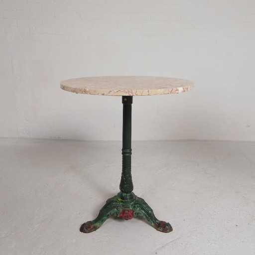 Bistro table with cast iron legs and marble top, 1920s