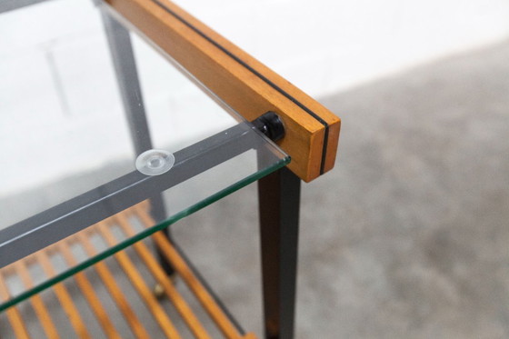 Image 1 of Serveerwagen uit de jaren 60, hifi-kast op wieltjes in teakhout, zwart metaal en glazen blad.