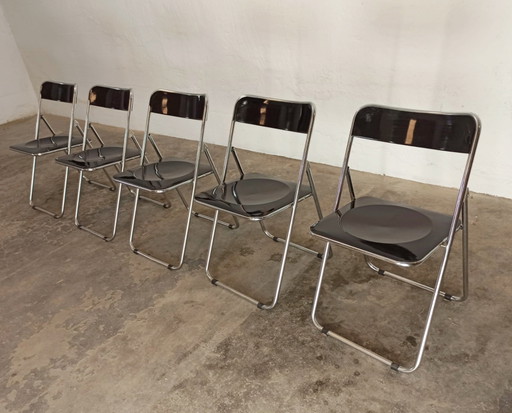5 vintage chromen en zwarte klapstoelen